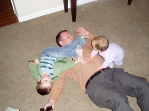 Dogpile on daddy!